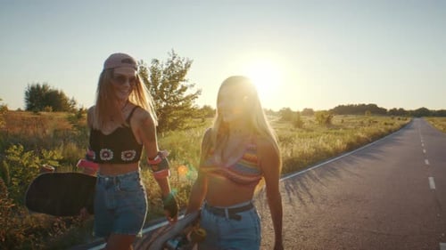 Women Friends Stroll Along Rural Road Radiating Carefree Joy