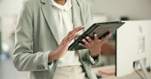 Business woman, hands and tablet in research, communication or online networking at office