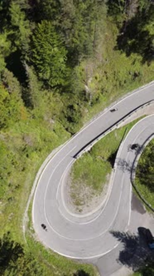 Winding Road Through Italian Forest