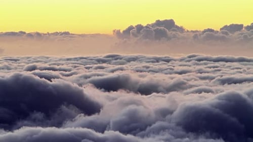 Golden hour time lapse above a sea of clouds in heavenly Hawaii