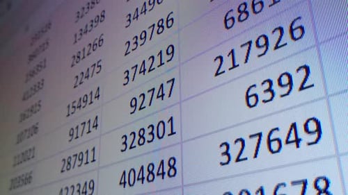 Closeup of Financial Cash Flow Data on PC Screen Mortgage Payment Sheet Schedule Loan Fee