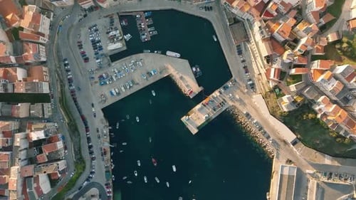 Aerial Drone View of a Sunlit European Coastal Fishing Village
