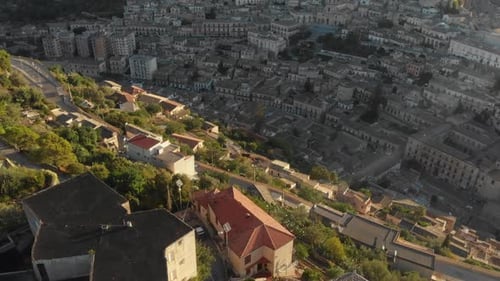 Beautiful city Modica at sicily during sunrise, aerial