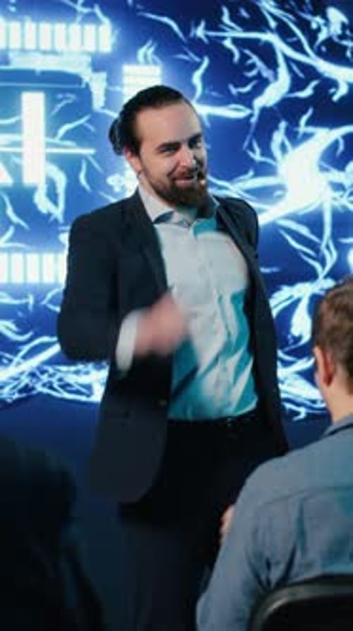 Man Giving Presentation on Tech to Audience
