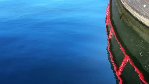 Fishing Boat Reflection On Sea Water 13