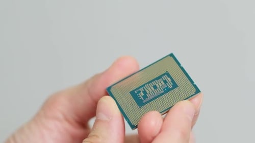 CPU in a Man's Hand