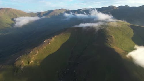 Lush Mountains and Rolling Hills Aerial View