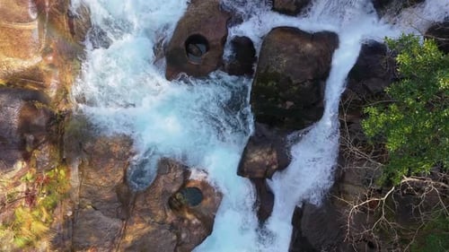 Top View Of Fervenza Da Noveira Waterfall In The Province Of A Coruña, Galicia, Spain. Aerial Descen