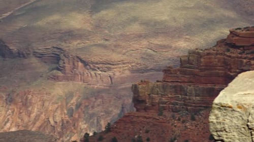 A slow pan of the Grand Canyon South Rim, zoomed in on the detail of the rock.