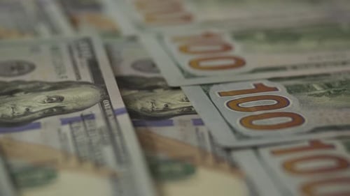 Close Up of Overlapping Hundred Dollar Bills