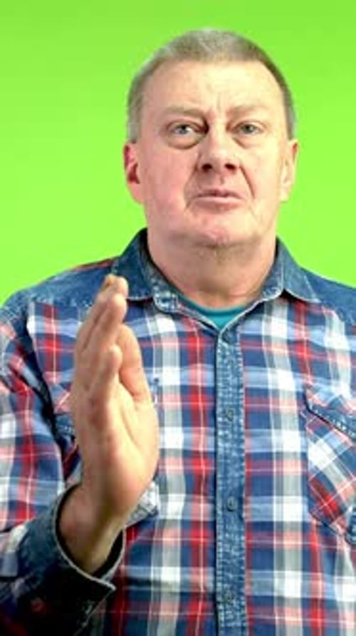 Senior Man Raises Hand Wants Asks Question or Make Statement Asks to Speak