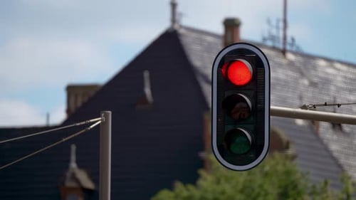 Traffic Light Semaphore Changing From Red to Green Streetlight Regulate Traffic Closeup