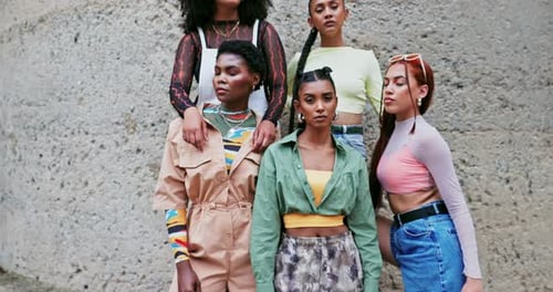 Stylish Young Women Posing Together in Urban Setting