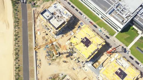 Aerial View of Construction Site in Urban Setting