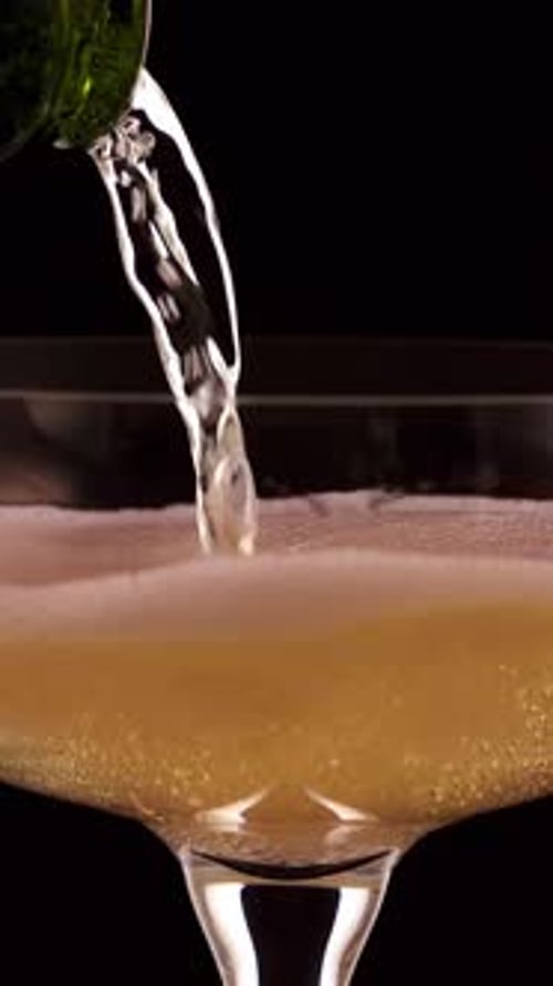 Pouring Champagne into a Glass Close Up