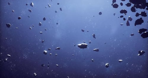Expansive View of Numerous Asteroids Floating in Deep Space
