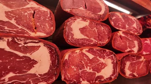 Fresh Cuts of Meat at Local Market Showcase