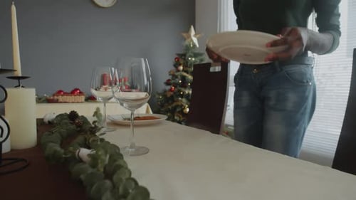 Setting Festive Christmas Table at Home