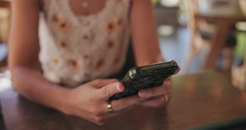 Woman, hands and typing in cafe with phone for social media post, online chat and text message