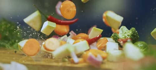 Mix vegetables falling on board