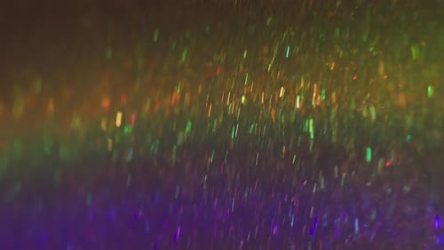 Abstract colorful glittering sparkles and particles