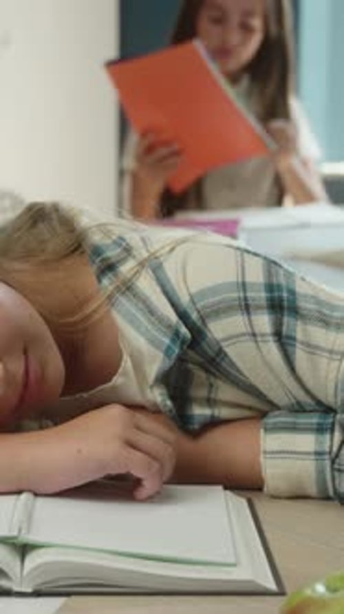 Exhausted Caucasian Teen Little Girl Sleeping at Desk in School Classroom Tired Student Child Kid