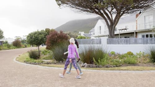 Women Walking for Exercise in Suburban Neighborhood