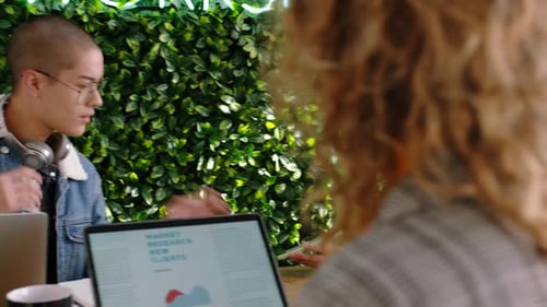 Young Adults Work Together at Modern Office