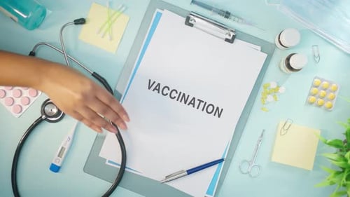 Medical Tools with "Vaccination" Form on Clinic Table