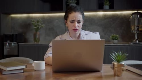 Woman Working from Home Stretches Neck in Pain