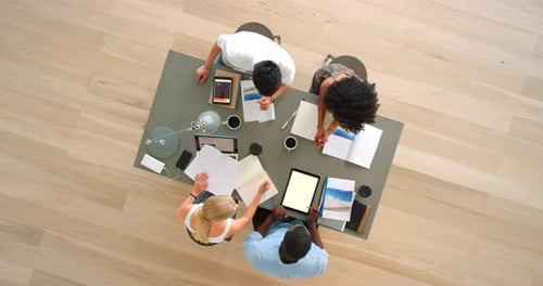 Team Collaborating on Design Project in Modern Office