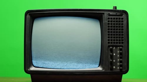 Retro Style TV Set with Green Screen Chroma Key Background Vintage 60s Analog Television with Grain