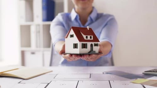 Architecture Building Construction and Real Estate Concept - Close Up of Female