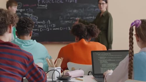 Students Learning Computer Programming in Classroom
