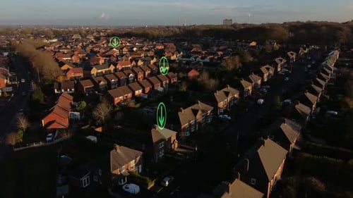 Flashing Arrow symbols over rural British townhouse neighbourhood homes rooftops aerial view