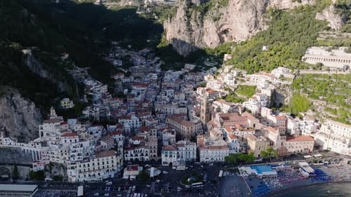 Scenic View Of The Famous Amalfi Village And Coast In Italy - aerial drone shot