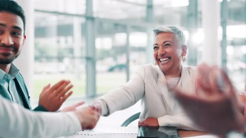 Business people, meeting and handshake with applause in partnership, welcome