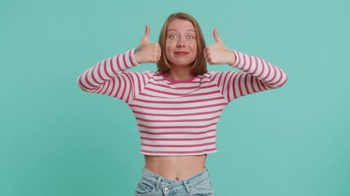 Smiling Woman Giving a Thumbs Up Approval