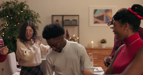 Diverse Friends Dancing at Holiday Christmas Party