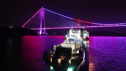 istanbul yavuz sultan selim bridge with purple light for awareness