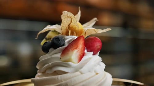 Close-up, bakery - delicious bun - cake on a rotating surface