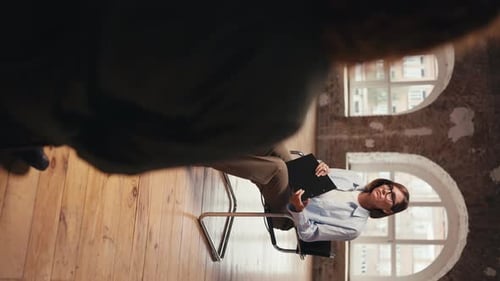 Woman Talking in Urban Workplace Office Setting