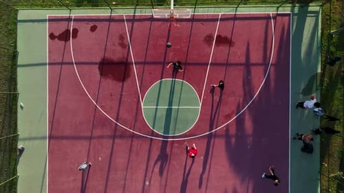 Aerial View of a Basketball Court During a Beautiful Sunset on the Shores of the Mediterranean Sea