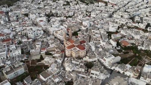 Aerial landscape view over a traditional italian village with white buildings