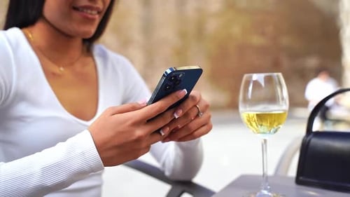 CloseUp Beautiful Young Female Hands Using Phone During Lunch Break City Life