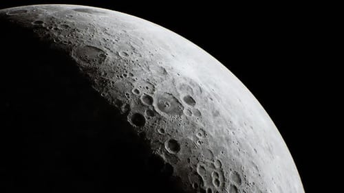 Captivating View of the Moons Surface Showing Craters and Shadows