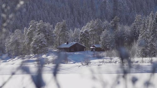Cabins On Snowy Landscape In Indre Fosen, Norway - wide
