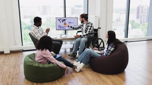 Diverse team collaborates on data analysis in office