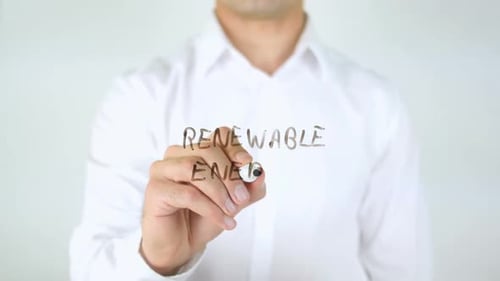 Erneuerbare Energien, Mann schreibt auf Glas