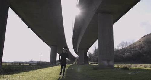 Adult man running athlete sprinting workout challenge training endurance in urban city